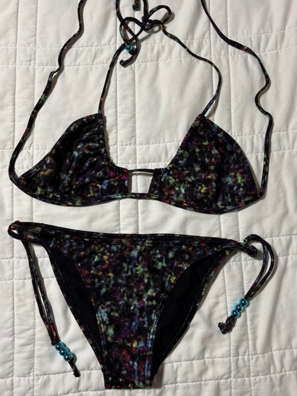 Never worn multicolored string bikini in US size 8